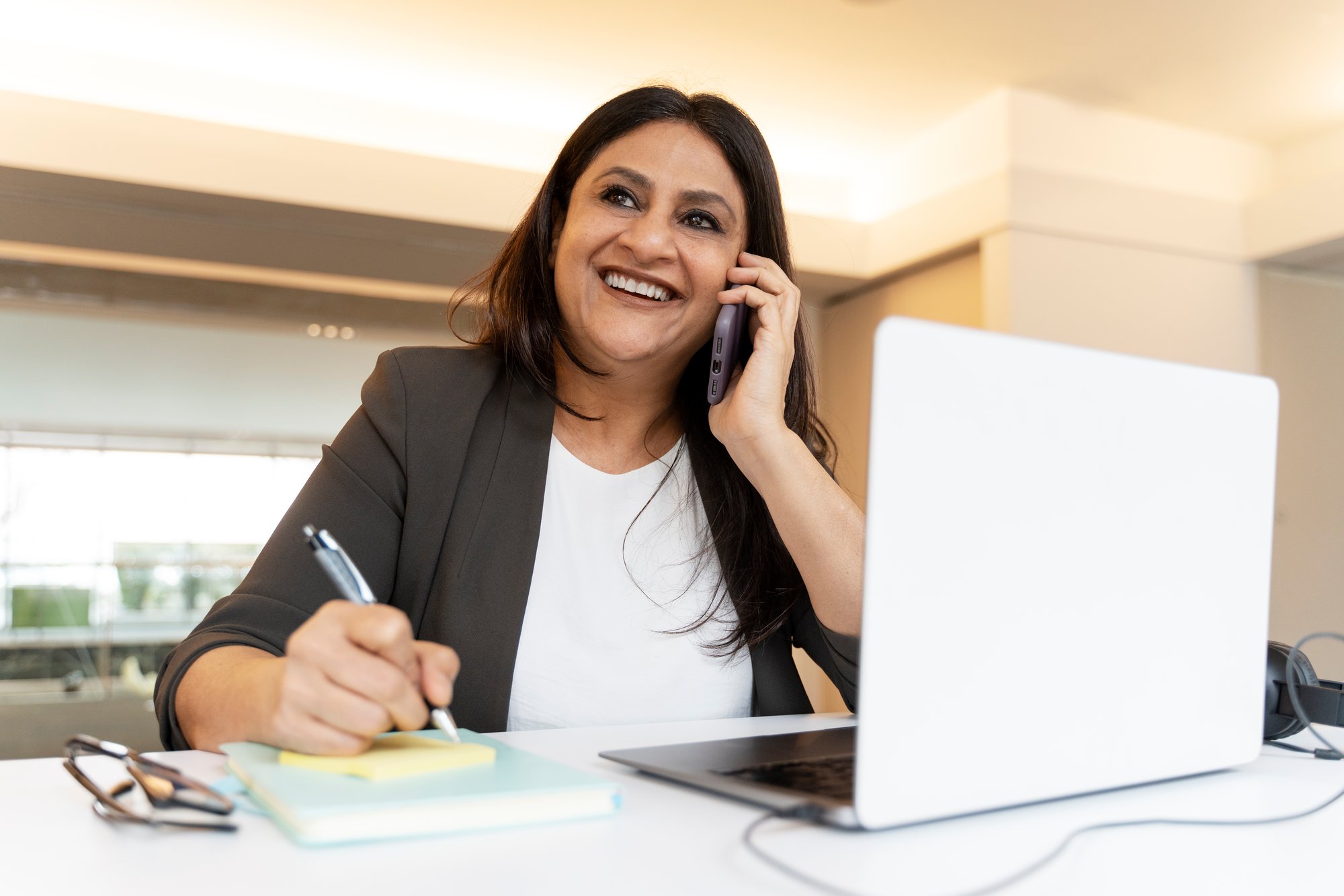 successful-asian-business-woman-talking-on-mobile-2025-02-20-09-06-09-utc successful-asian-business-woman-talking-on-mobile-2025-02-20-09-06-09-utc